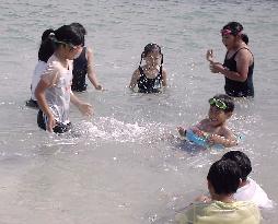 Okinawa opens beaches for early arrival of 'summer'